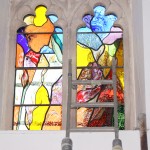 The Sower window being installed